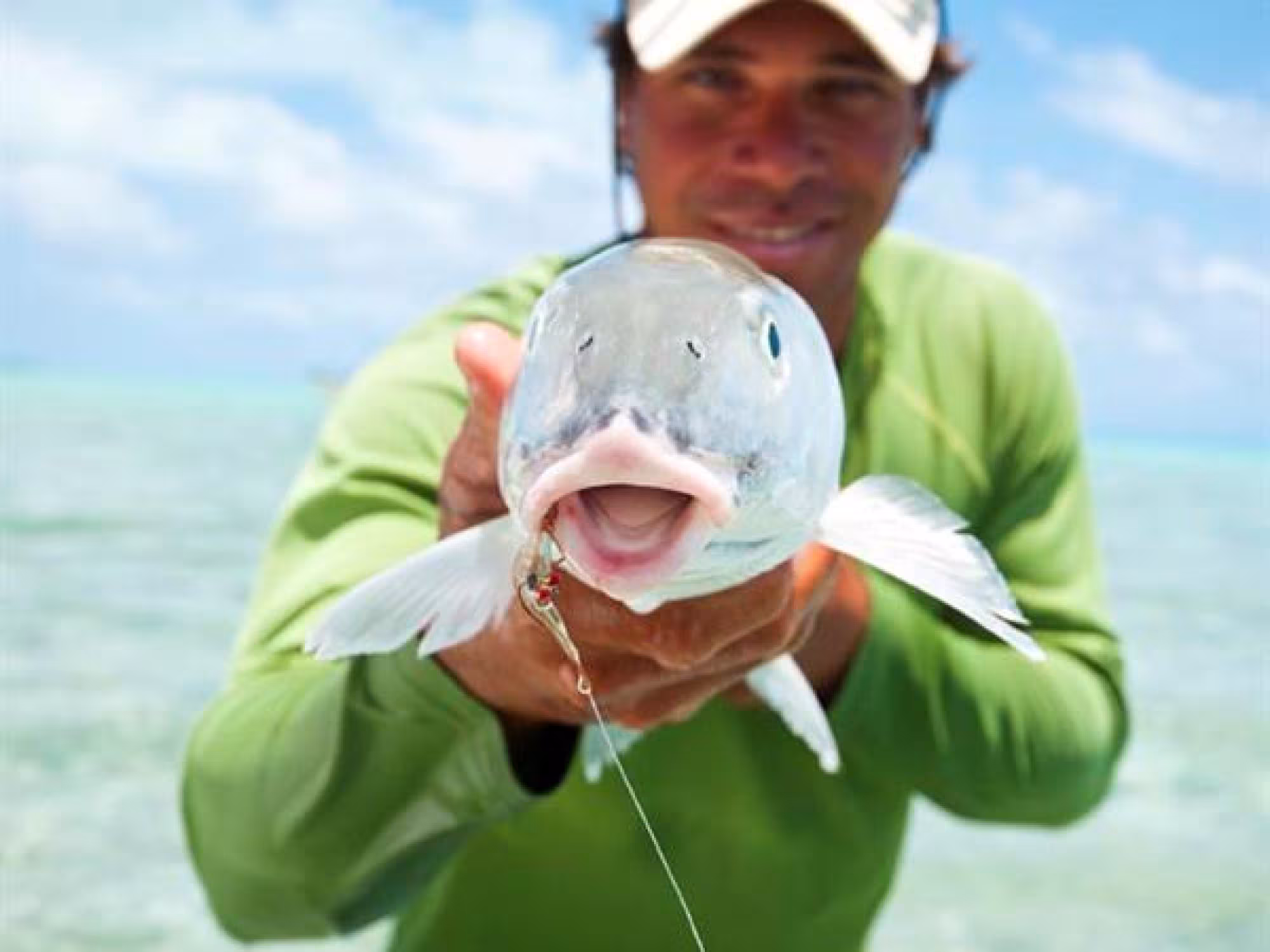 man holds fish
